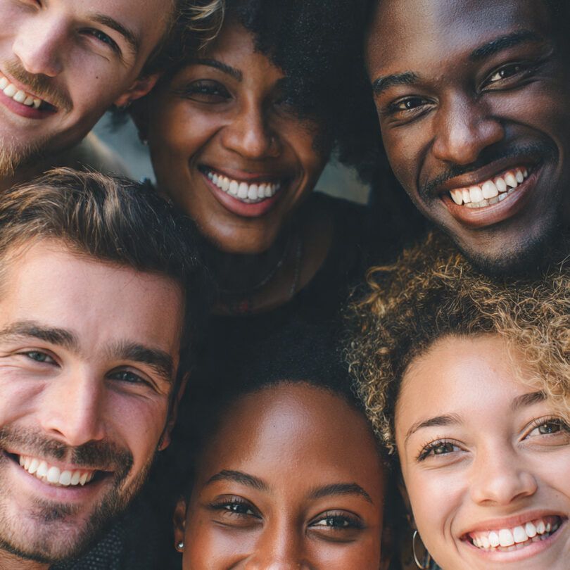 picture of males and females smiling having